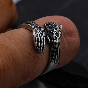 Retro punk metal ring featuring a skull hands embrace design in a vintage silver finish