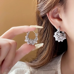 French vintage silver plated cluster pearl hoop earrings shown on model ear