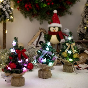 Mini LED Christmas trees with linen base, decorative balls and bows in three vibrant colors