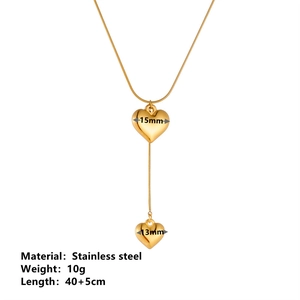 Detail of gold double heart pendant necklace in stainless steel with exact measurements