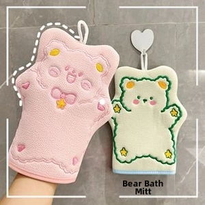 Detail of cute bear-shaped bath gloves with hanging loops in pink and cream colors