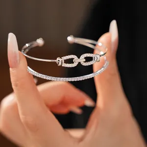 Double-layer silver bangle set with cubic zirconia horsebit buckle design for women