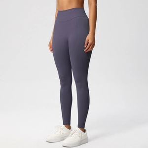 Detailed texture of seamless high-waist yoga leggings in dark purple gray with firm waistband