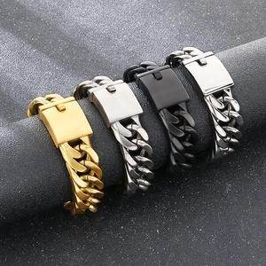 Detail of four colored Cuban link bracelets on display showing 18mm matte and polished finish