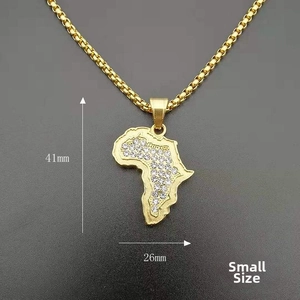 Detail of small iced out gold Africa map pendant with dimensions 41mm by 26mm