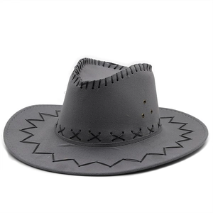 Détail d'un chapeau de cow-boy gris foncé avec coutures noires et œillets d'aération