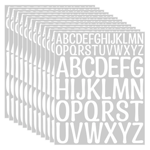 Close-up of white waterproof vinyl letter stickers in two sizes for gift labeling