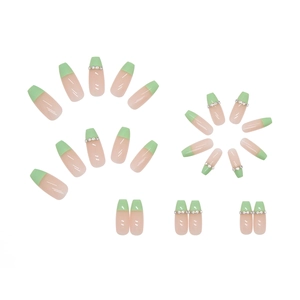Long trapezoid press-on nails in nude pink and green French tip with silver rhinestones
