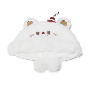 Detail of white plush bear hat with embroidered facial features and red cherry top