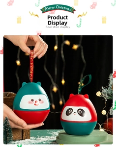 Christmas snowman and panda egg-shaped gift containers with festive ribbon handles