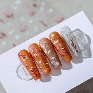 Floral butterfly nail art stickers in vibrant orange and glitter silver with Dream flower text
