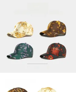 Detail of four baseball caps with ethnic floral embroidery in diverse color patterns