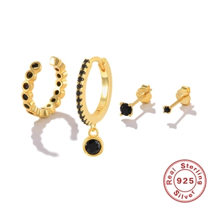 Golden S925 sterling silver earring set with black round gemstones and 925 hallmarks