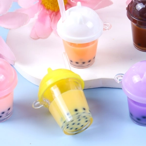 Cute bubble tea cup keychains in multiple colors with liquid and tiny pearls