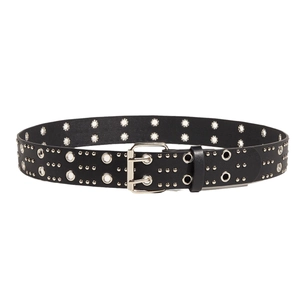 Punk black leather belt with silver double grommets and metal studs on white background