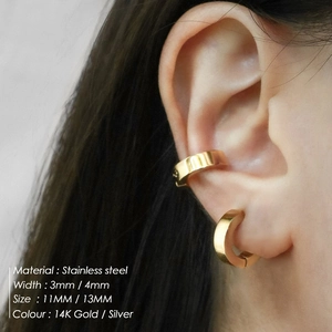 Set of 14K gold-plated stainless steel ear cuffs and hoop earrings shown on model