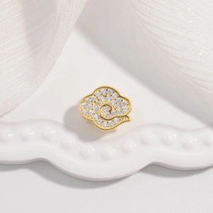 Detailed close-up of S925 silver auspicious cloud charm with pavé zircon and gold plating
