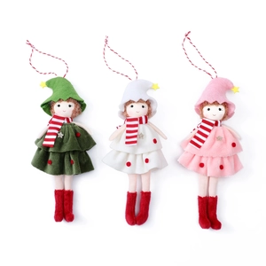 Three plush Christmas elf ornaments in green white and pink with stars and striped scarves