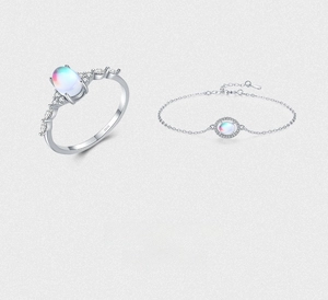 Macro shot of S925 sterling silver moonstone ring and bracelet jewelry set with zircon