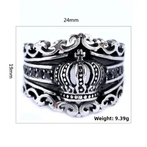 Macro view of crown ring with cross carvings and black gems showing dimensions 24x19mm