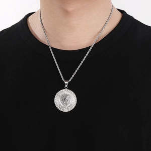Silver lion head pendant with rhinestones and Greek key pattern on twisted rope chain