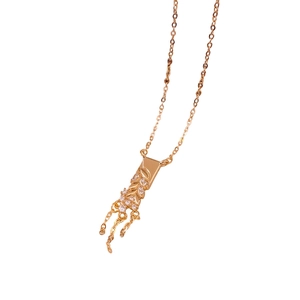 18K gold plated wheat tassel pendant necklace with crystals on a clean white background