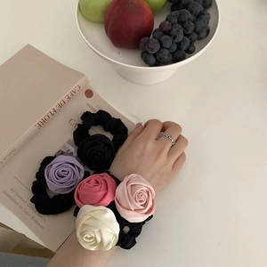 Elegant satin rose hair scrunchies in black, purple, pink and cream colors with high elasticity