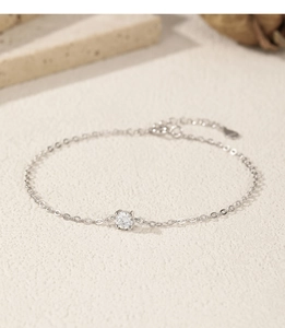 Detailed close-up of 925 sterling silver chain bracelet with a 0.5ct moissanite charm