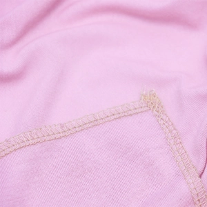 Pink jersey cotton headscarf shawl featuring detailed overlock stitching and soft texture