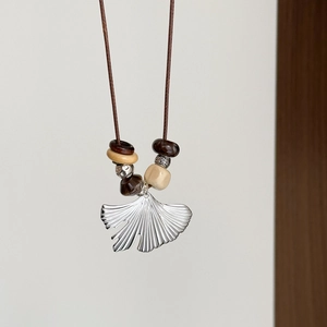 Silver stainless steel ginkgo leaf pendant necklace with elegant wood beads for women