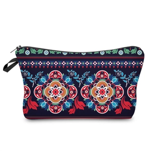 Detail view of colorful mandala pattern on navy blue cosmetic bag with black zipper