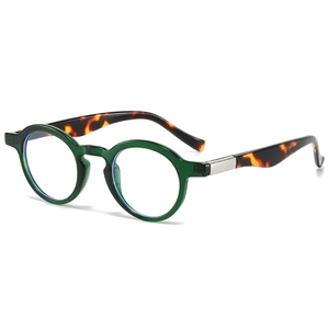 Classic green round sunglasses with tortoiseshell temples shown at 45-degree angle