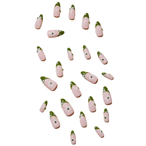 Pink and green French almond press-on nails with white daisies and small rhinestones