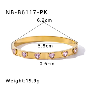 Detail of 18k gold plated bangle with pink heart zircons and dimensions display
