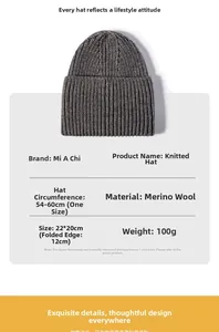 Detail view of dark grey cashmere knit beanie with ribbed texture and size parameters