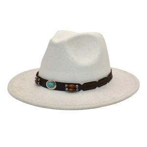 Detail of western fedora hat with brown leather band, wooden beads and turquoise stone