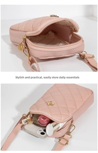 Detail of pink quilted PU leather phone bag with floral gold clasp and storage capacity