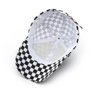 Inside view of black and white checkerboard cotton baseball cap showing lining and stitching