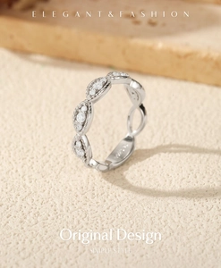 Detailed macro of S925 silver ring featuring marquise hollow patterns and twisted textures