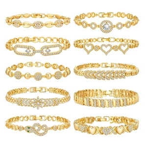 Set of ten gold-plated bracelets with heart and floral motifs encrusted with white zircons