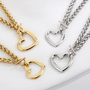 Golden and silver stainless steel heart pendant necklaces with toggle clasp in a set