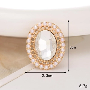 Macro detail of pearl and crystal shoe charm charm with 3cm height and 2.3cm width