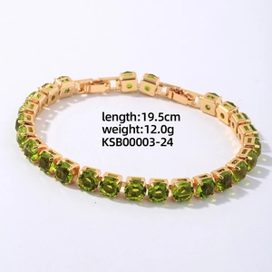 Detail view of 19.5cm gold tennis bracelet with green zircon stones and weight specs