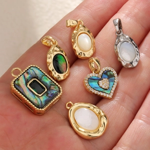 Abalone shell and mother-of-pearl charms in gold-plated copper for DIY jewelry making