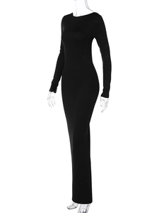 Side view of black long sleeve maxi dress showing slim fit and pleated details on mannequin