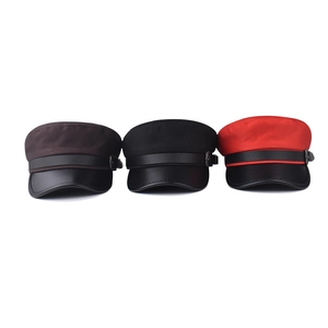 Flat top military berets with leather brim and metal chain trim in black, red, and brown