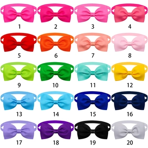 Grid view of 20 assorted colors of ribbed fabric pet bow ties in a 5x4 layout