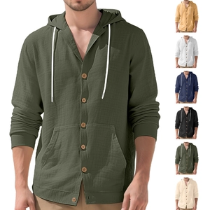Detail view of cotton linen hooded shirt with front kangaroo pocket and button closure