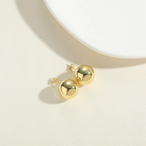 Polished 14K gold plated sphere stud earrings with butterfly back on minimalist background