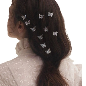 Laser butterfly hair claw clips in silver metal for elegant back-of-head styling